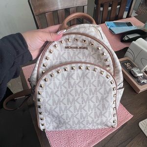 Michael kors monogram backpack.